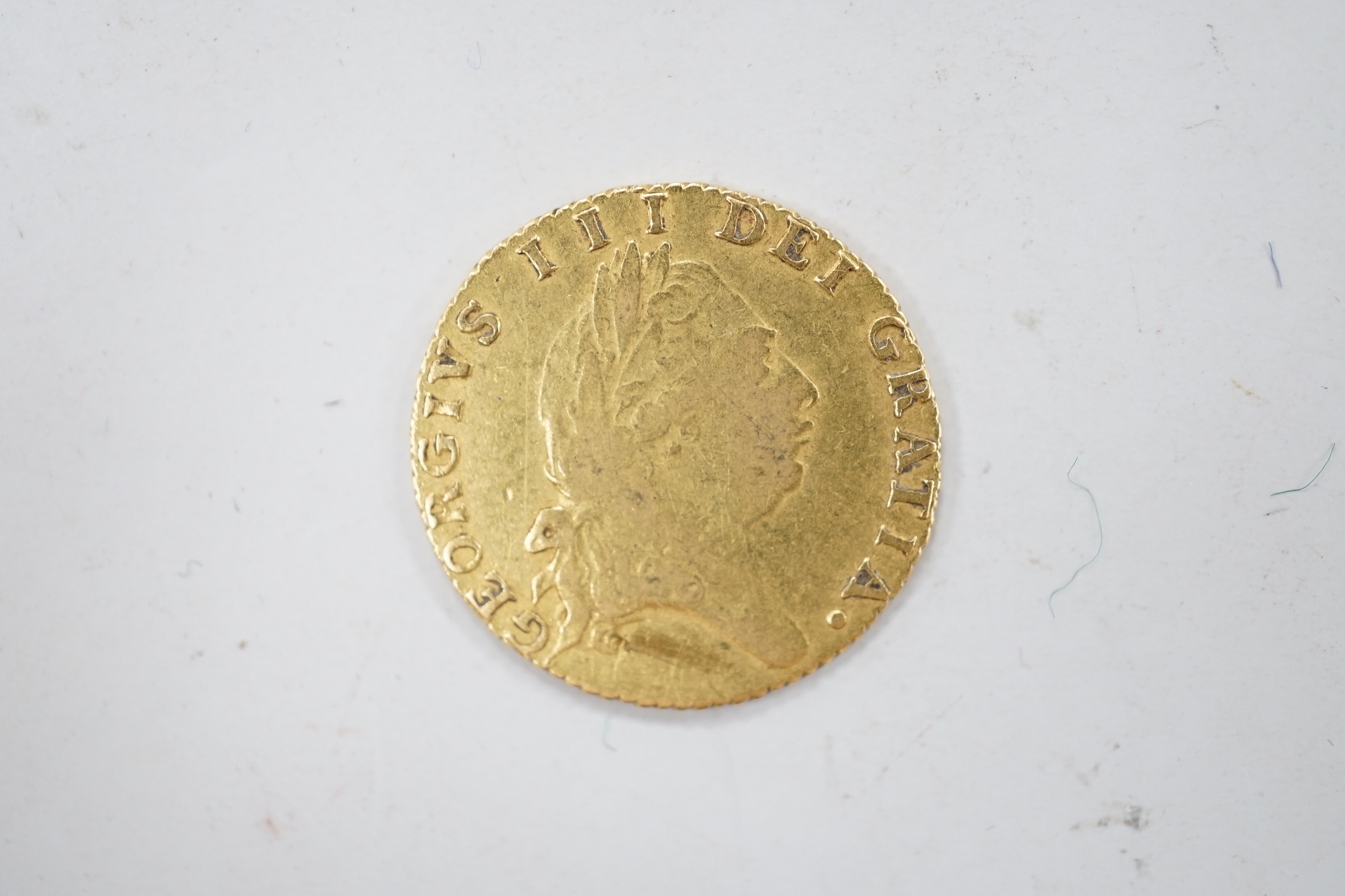 A George III gold half guinea 1794, about F